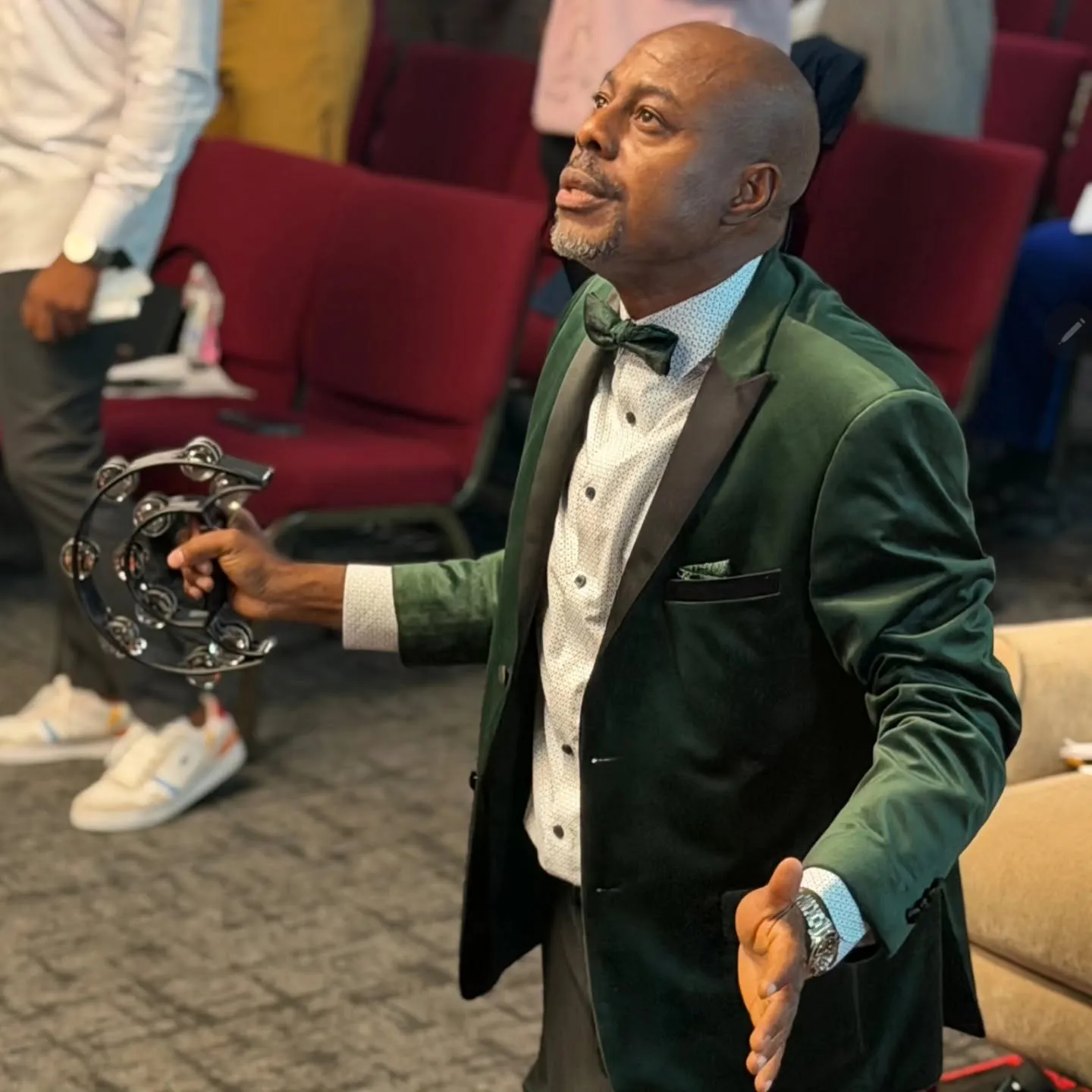 Pastor Sam Kayode worshipping at RCCG Victory House Wichita